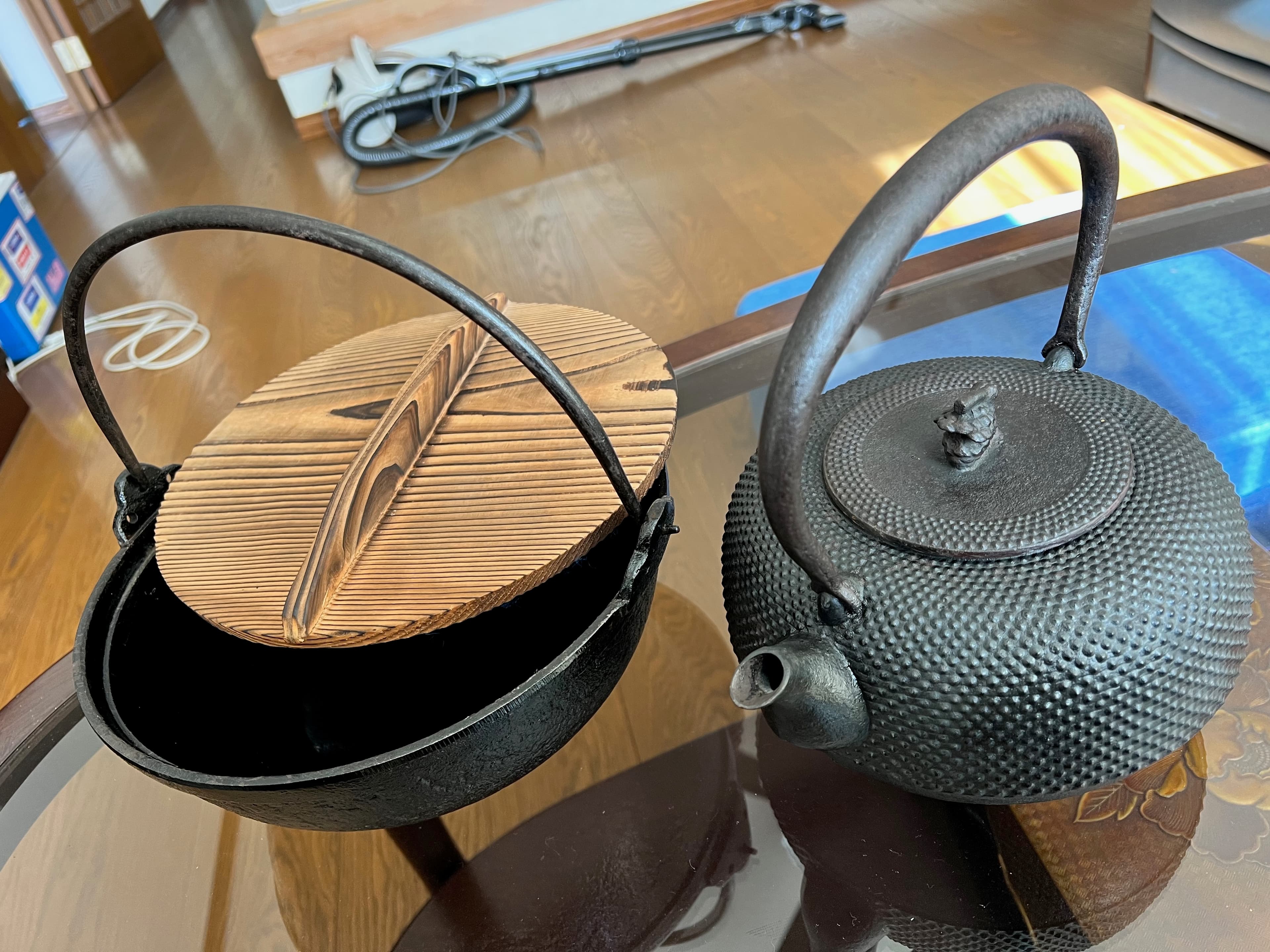 Nanbu iron kettle restored beside the irori
